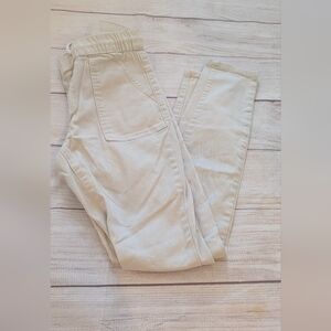 Satin Doll off white drawstring skinny pants. Size 4